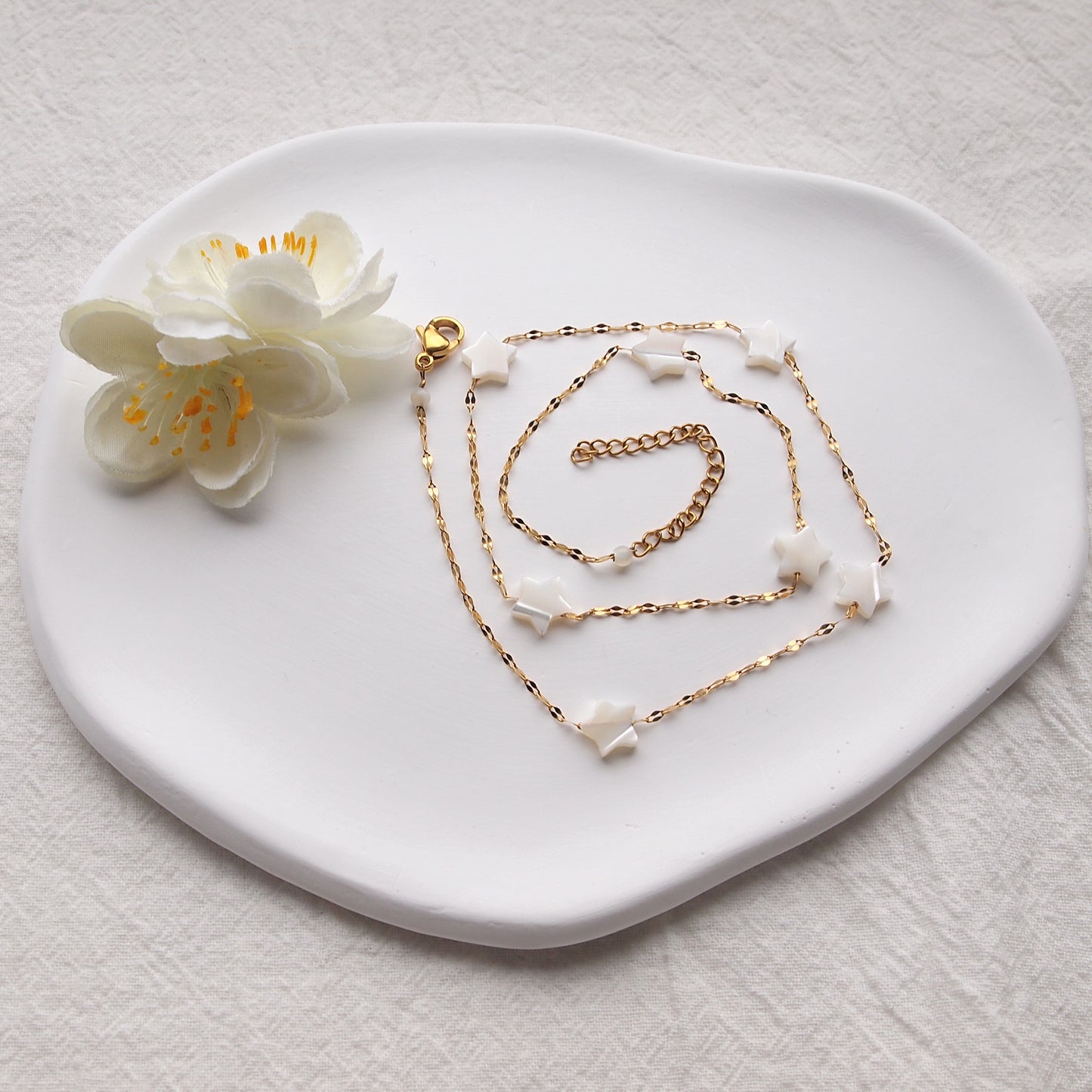 gold plated stainless steel necklace with star pendants, mother of pearl necklace