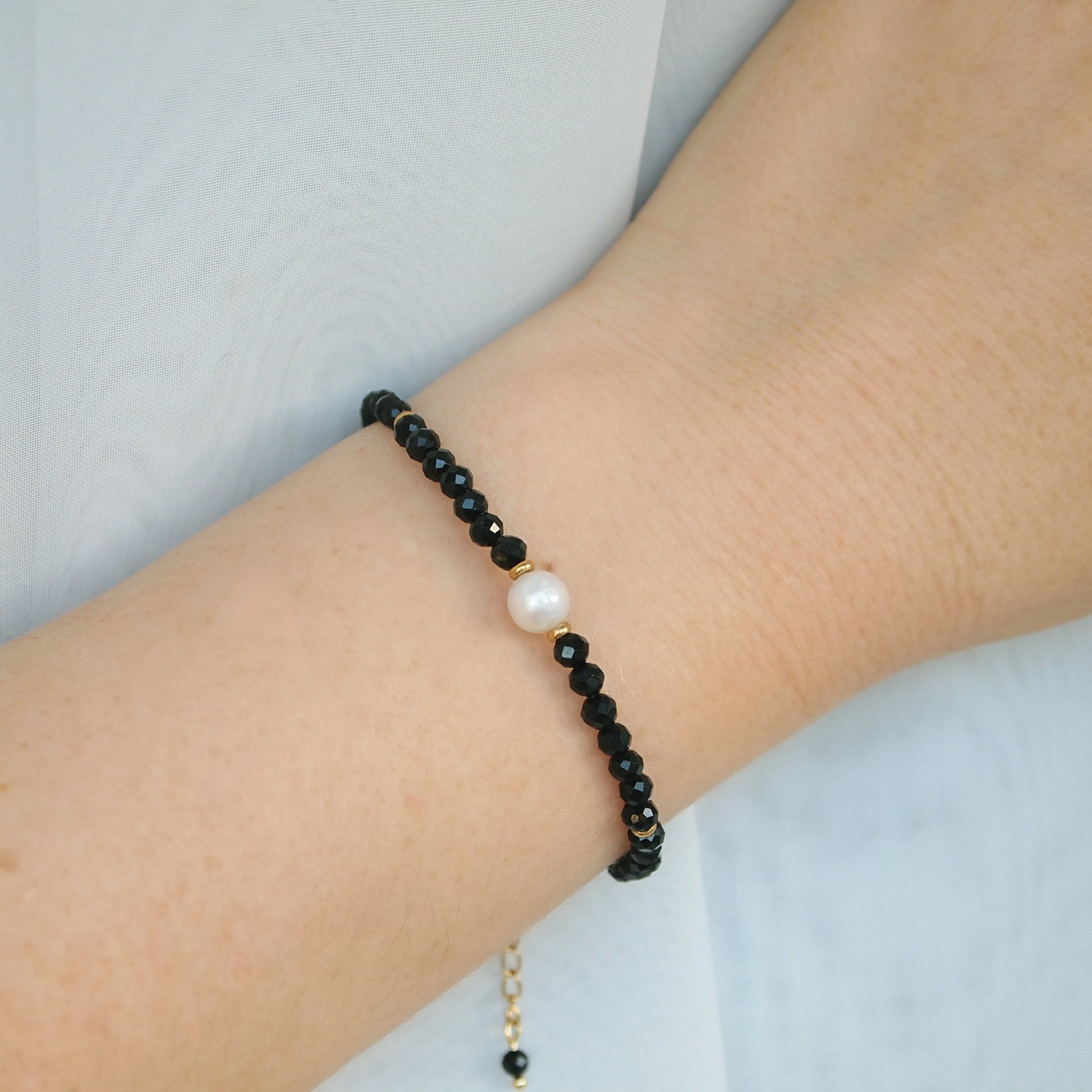 woman gemstone bracelet with black tourmaline and freshwater pearl
