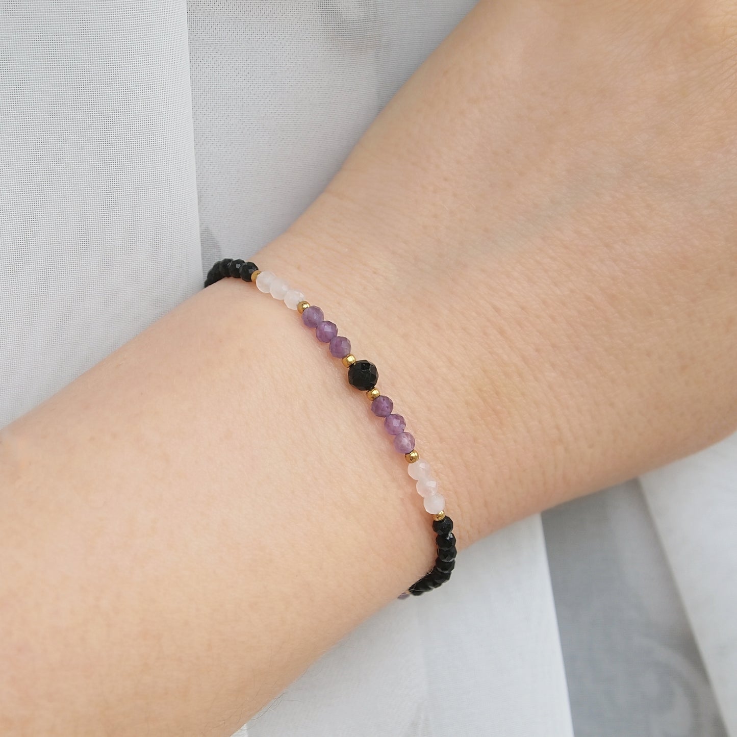 stretch gemstone bracelet with black tourmaline, rose quartz and amethyst