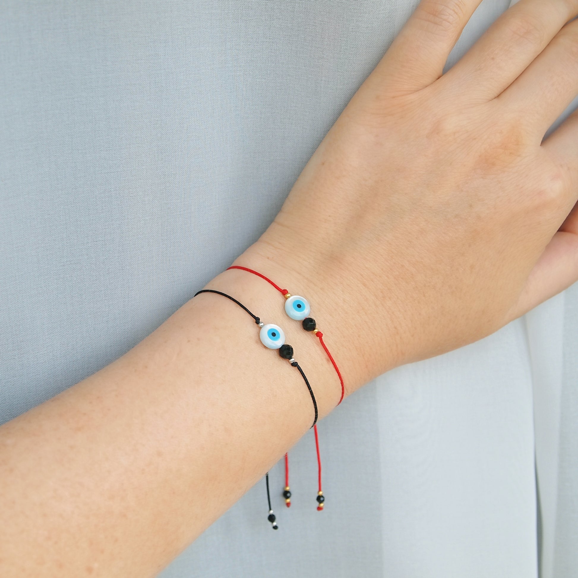 red string protection bracelet with turkish eye and black tourmaline