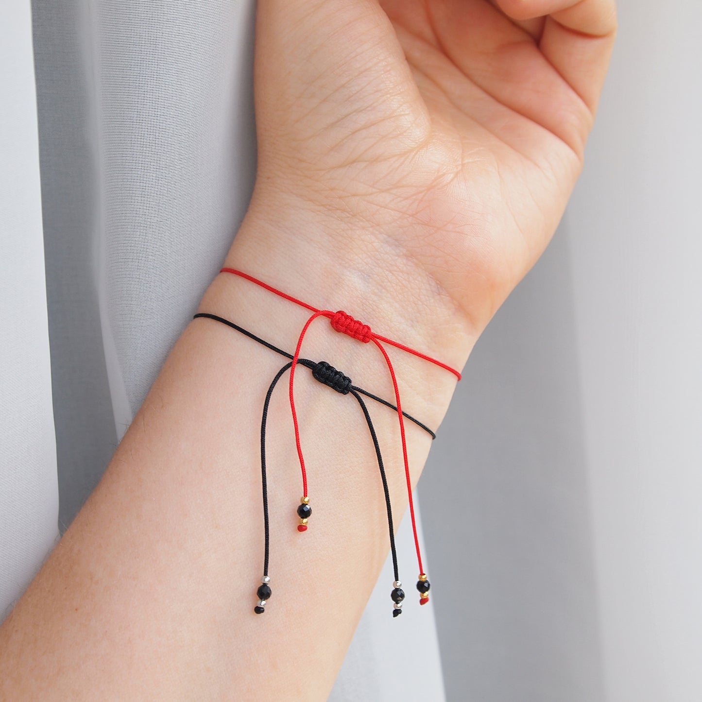 Red string bracelet with evil eye and black tourmaline