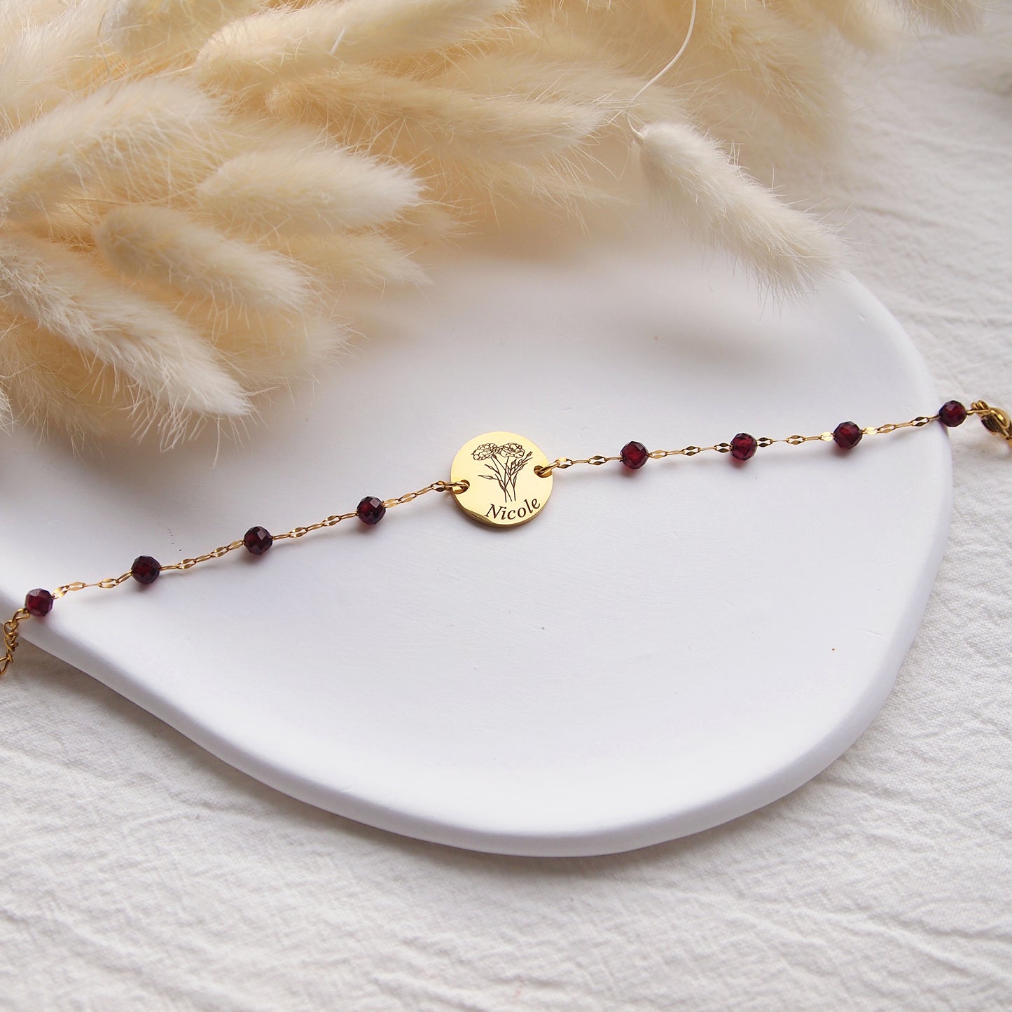 custon garnet bracelet, personalized with january birth flower and name or initial