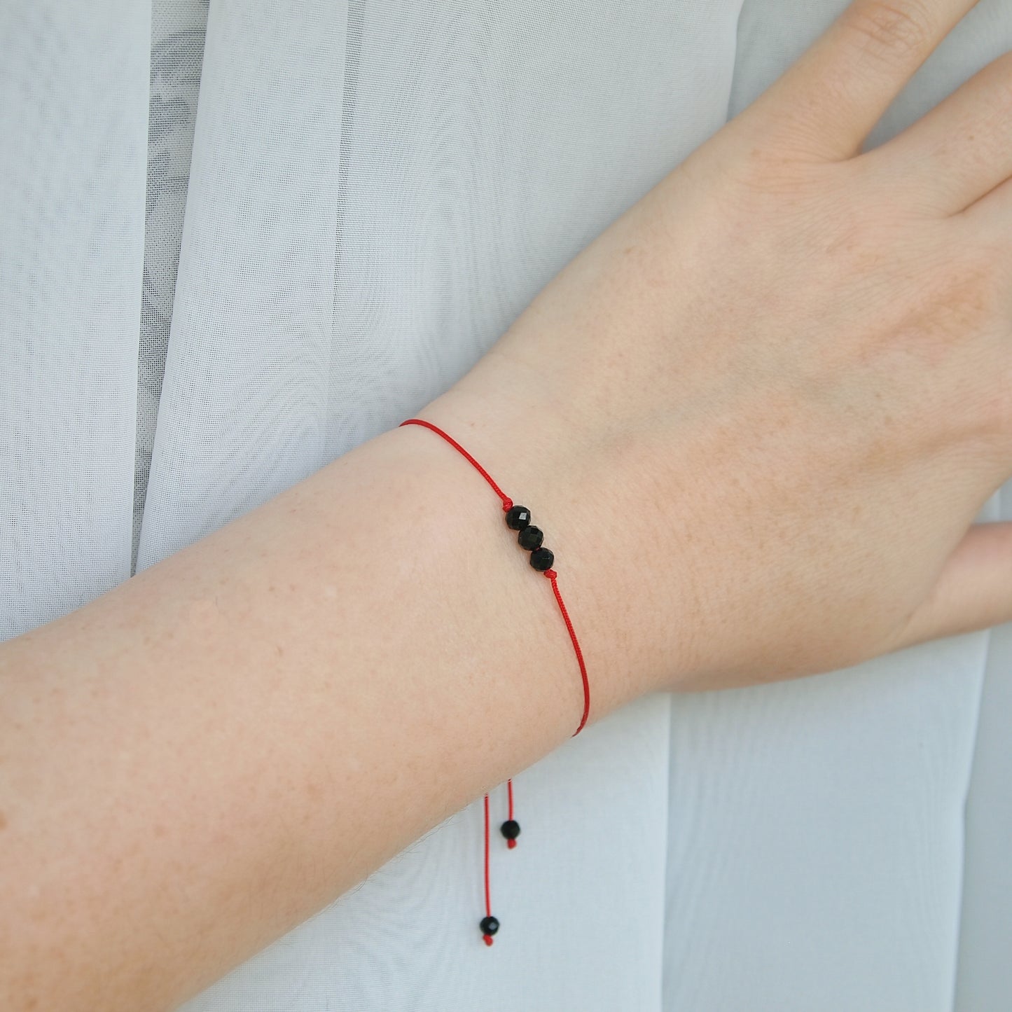 red string bracelet for protection