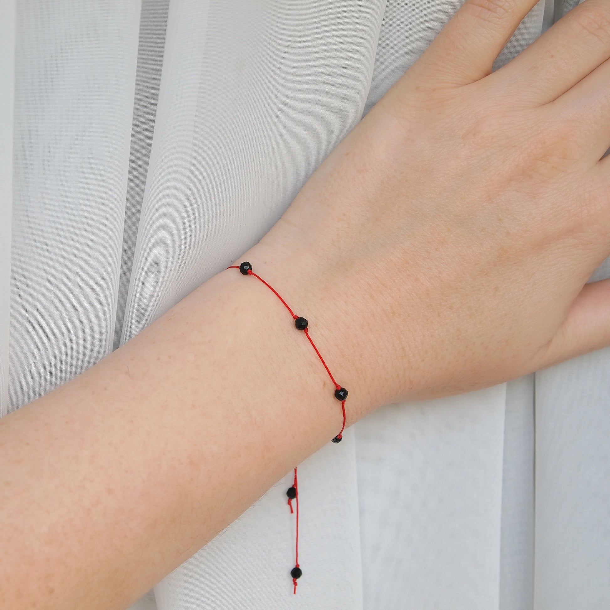 black tourmaline red string protection bracelet