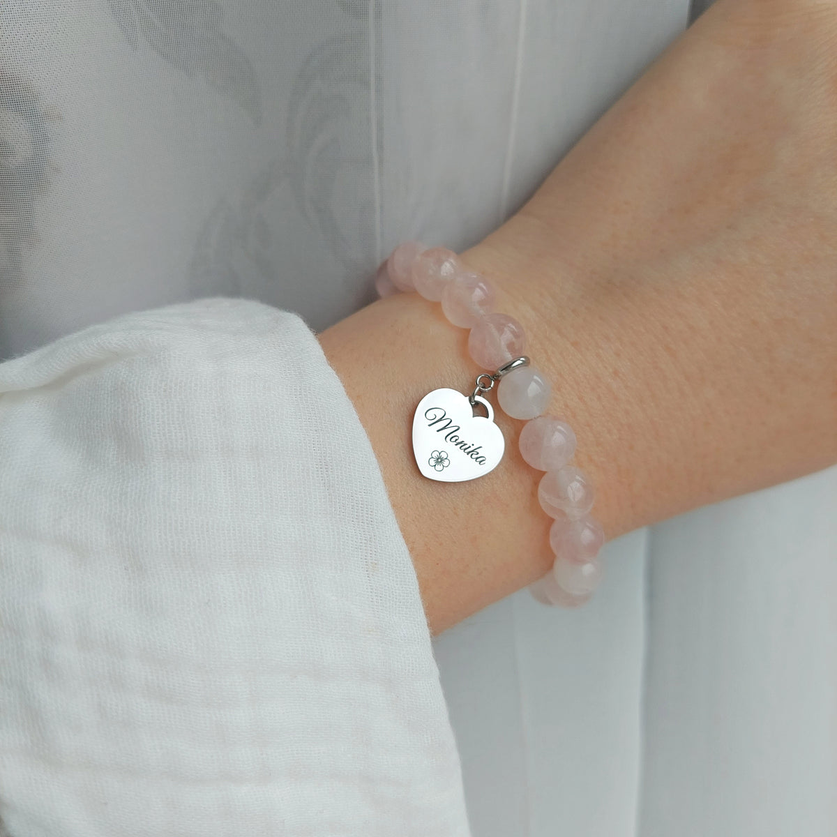 natural rose quartz bracelet on stretchy cord with custom engraved name charm