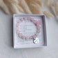 stretch natural rose quartz bracelet with custom name charm, engraved charm is detachable