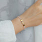 delicate rose quartz bracelet with engraved heart beads
