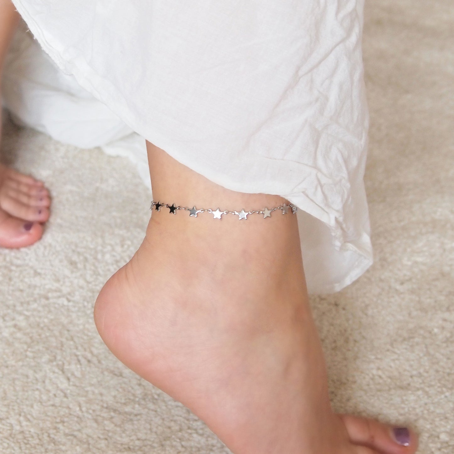 silver steel woman anklet with stars
