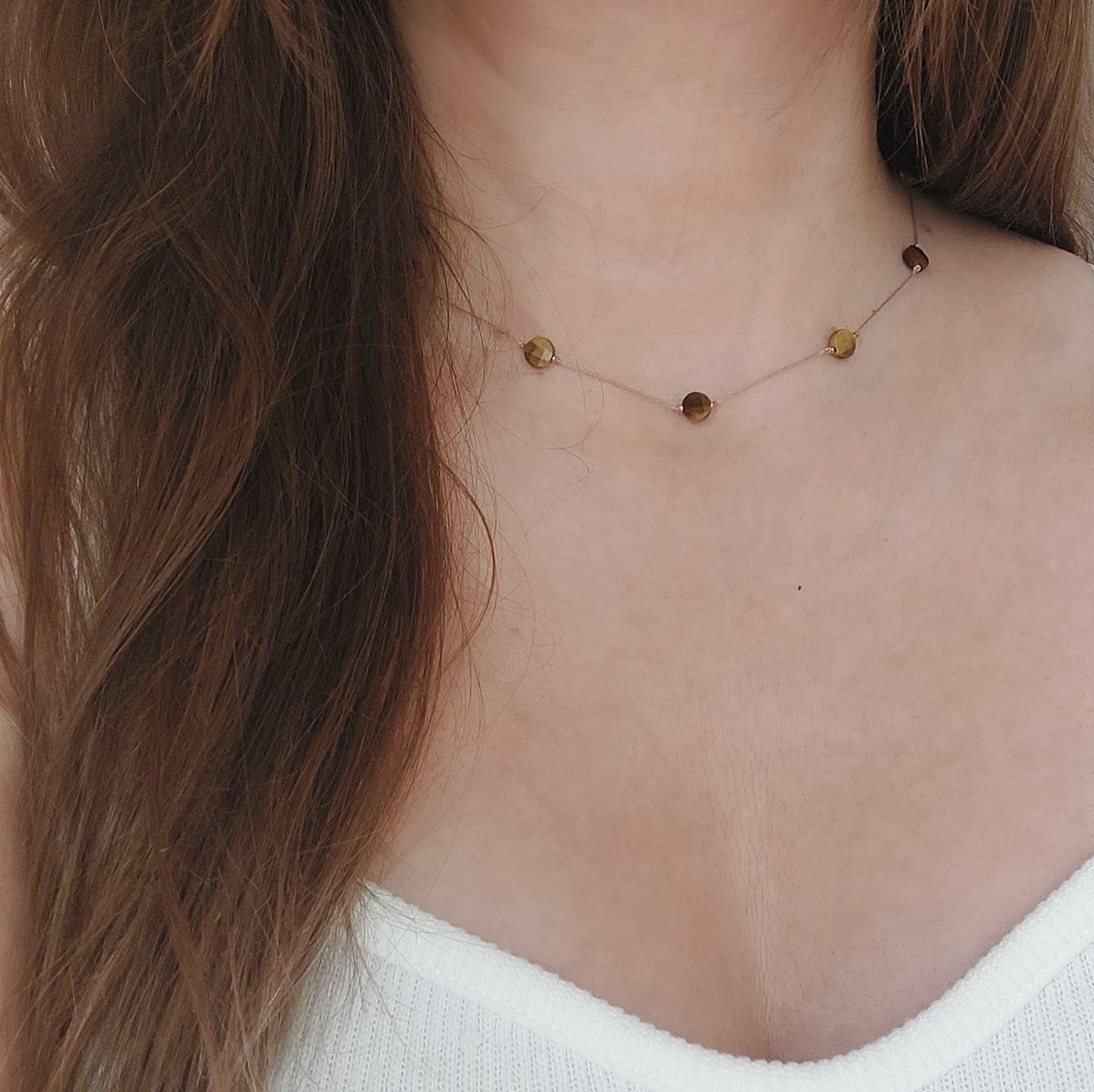 thin woman choker necklace, made with tiger eye and cord