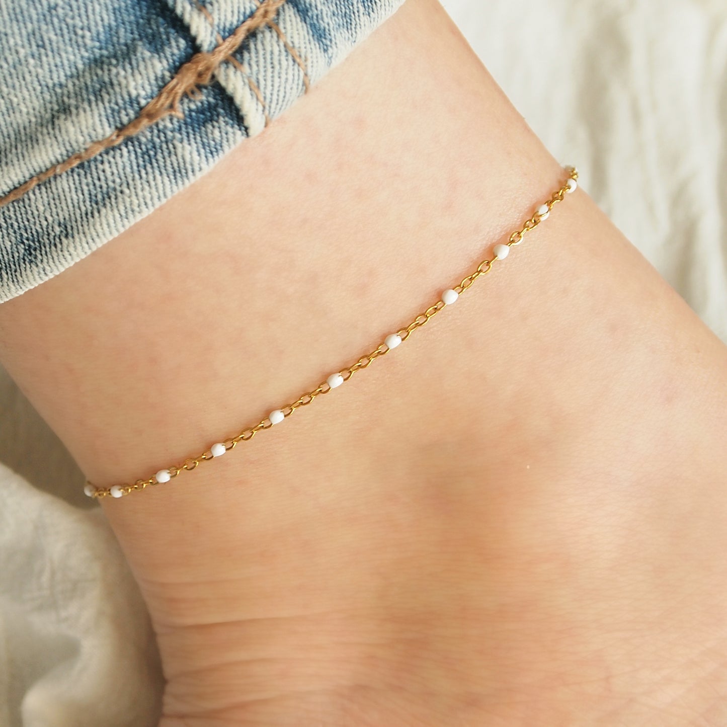 white beaded woman anklet