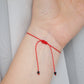 Very minimal red string bracelet with tourmaline